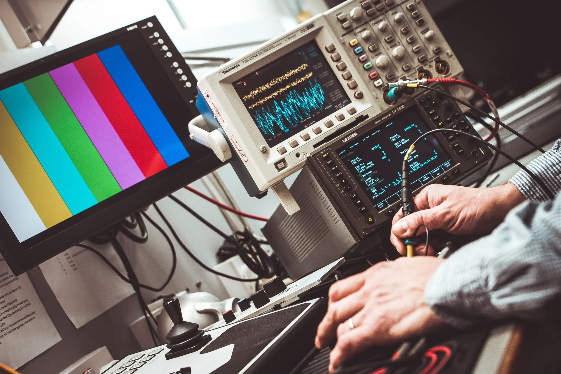 Electronic signal measurement and instrument adjustment; representative process photograph