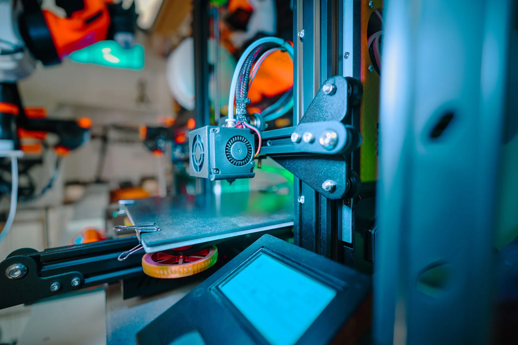 A 3D printer creating a physical model; representative process photograph
